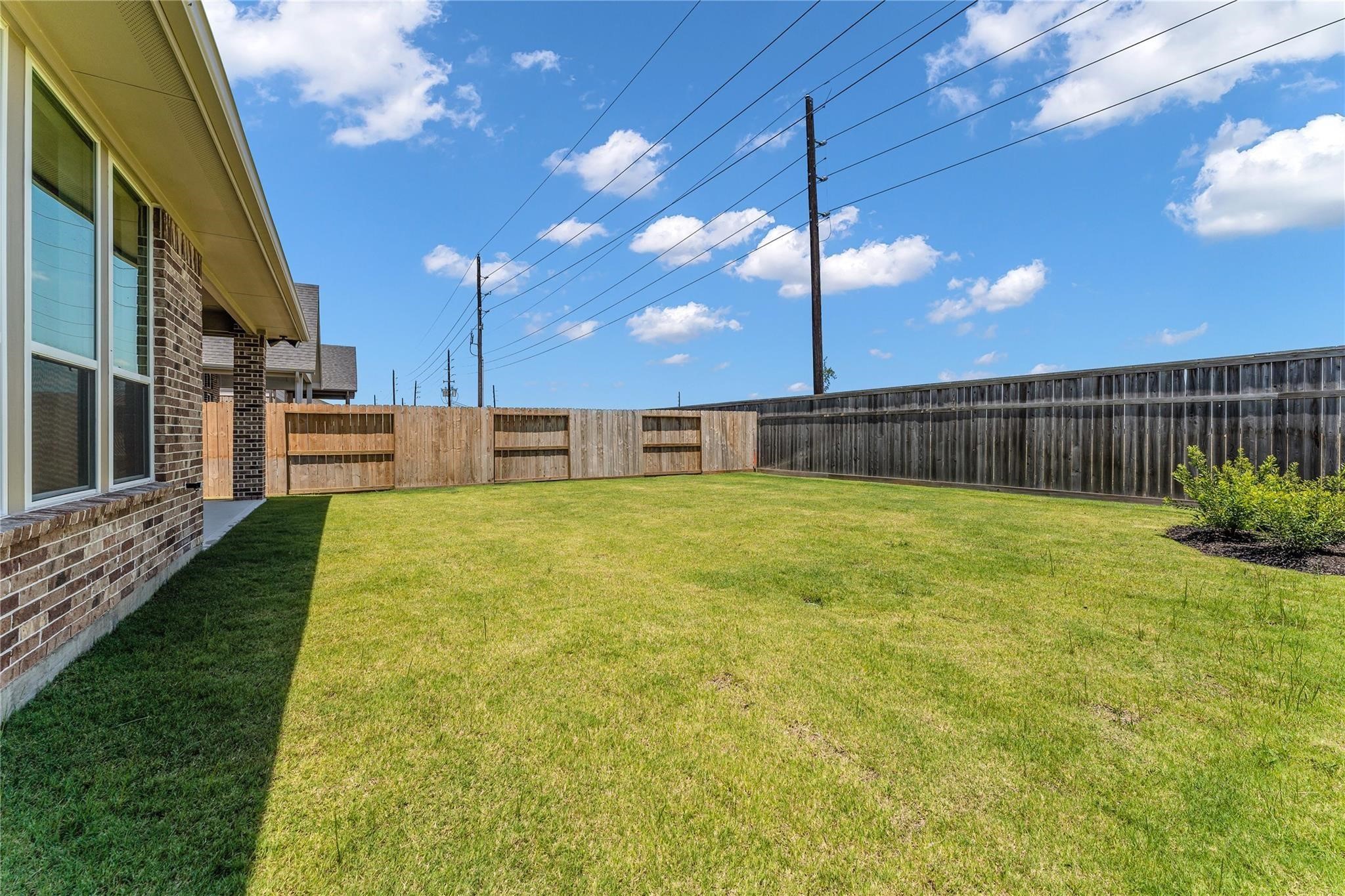 28938 Hauter Way Fulshear, TX 77441 - Photo 39 of 42 a view of a swimming pool with a patio