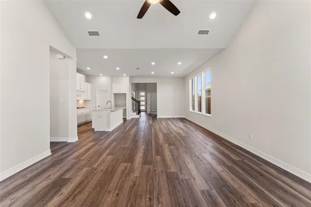 a view of kitchen and wooden floor