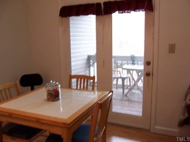 3346 Tarleton West Durham, NC 27713 - Photo 6 of 12 The dining area opens to the covered deck. Dining Room