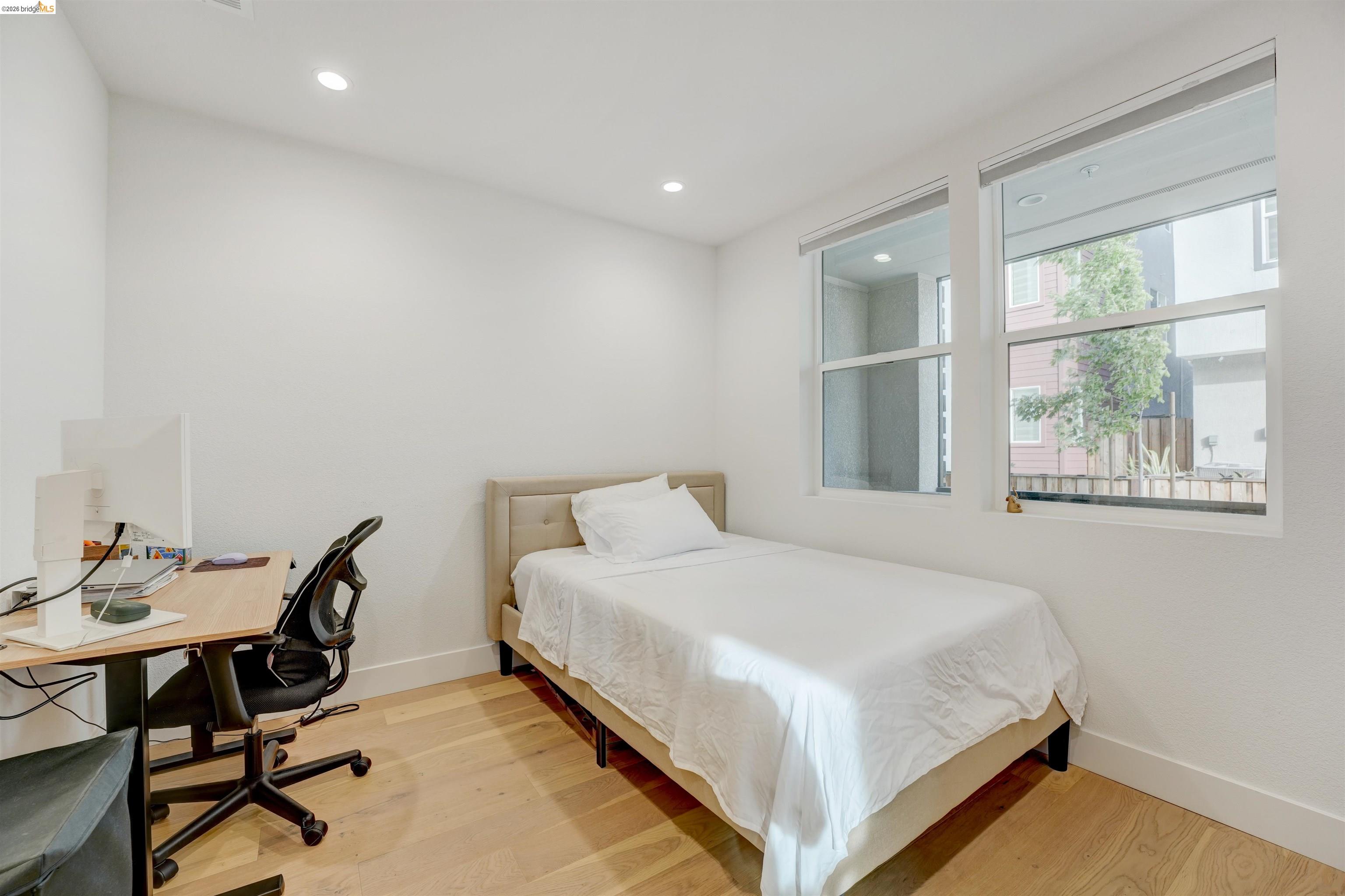 7101 Melon Court San Ramon, CA 94583 - Photo 6 of 58 a bedroom with a bed and a table in it