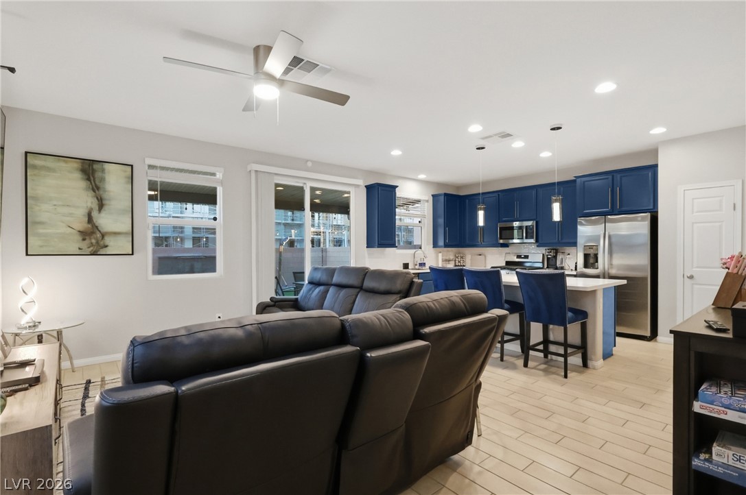 1921 Miller Ridge Avenue North Las Vegas, NV 89031 - Photo 2 of 26 This inviting space combines comfort and culinary elegance, perfect for everyday living.