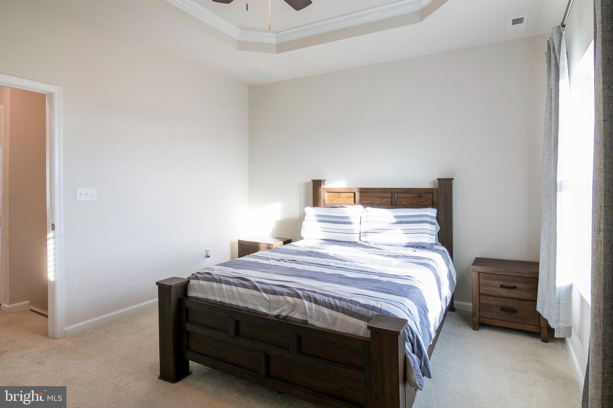 33 Roundstone Run Swedesboro, NJ 08085 - Photo 24 of 43 a bedroom with a bed and a cabinets