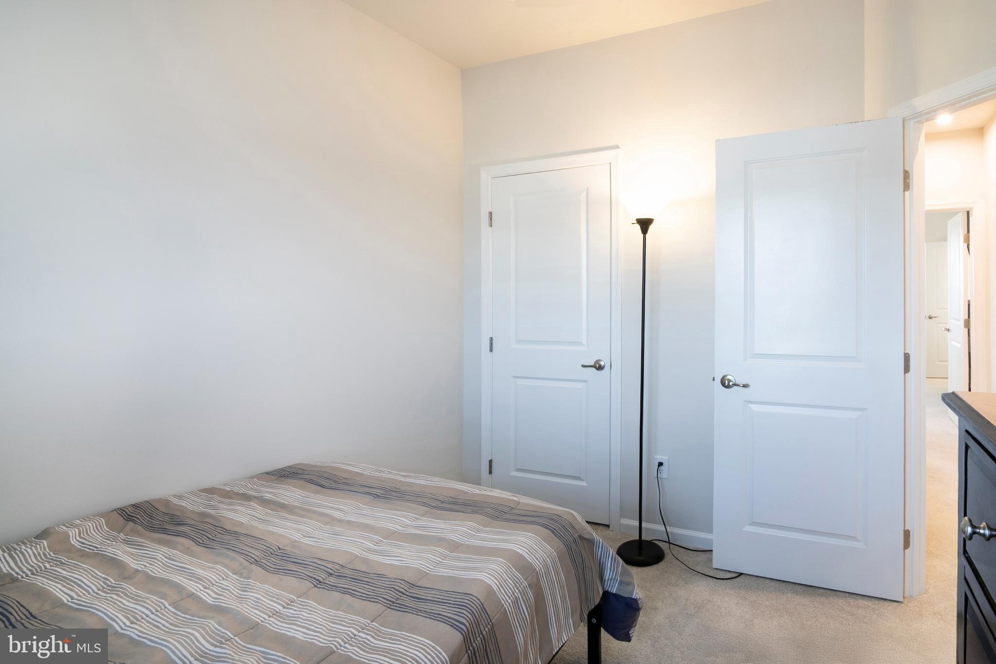 33 Roundstone Run Swedesboro, NJ 08085 - Photo 29 of 43 a room that has a bed in it