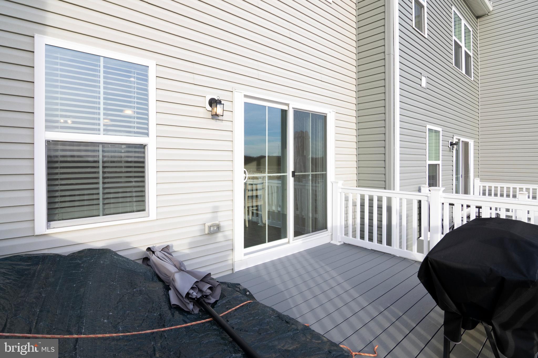 33 Roundstone Run Swedesboro, NJ 08085 - Photo 40 of 43 a view of a chair and table in the balcony
