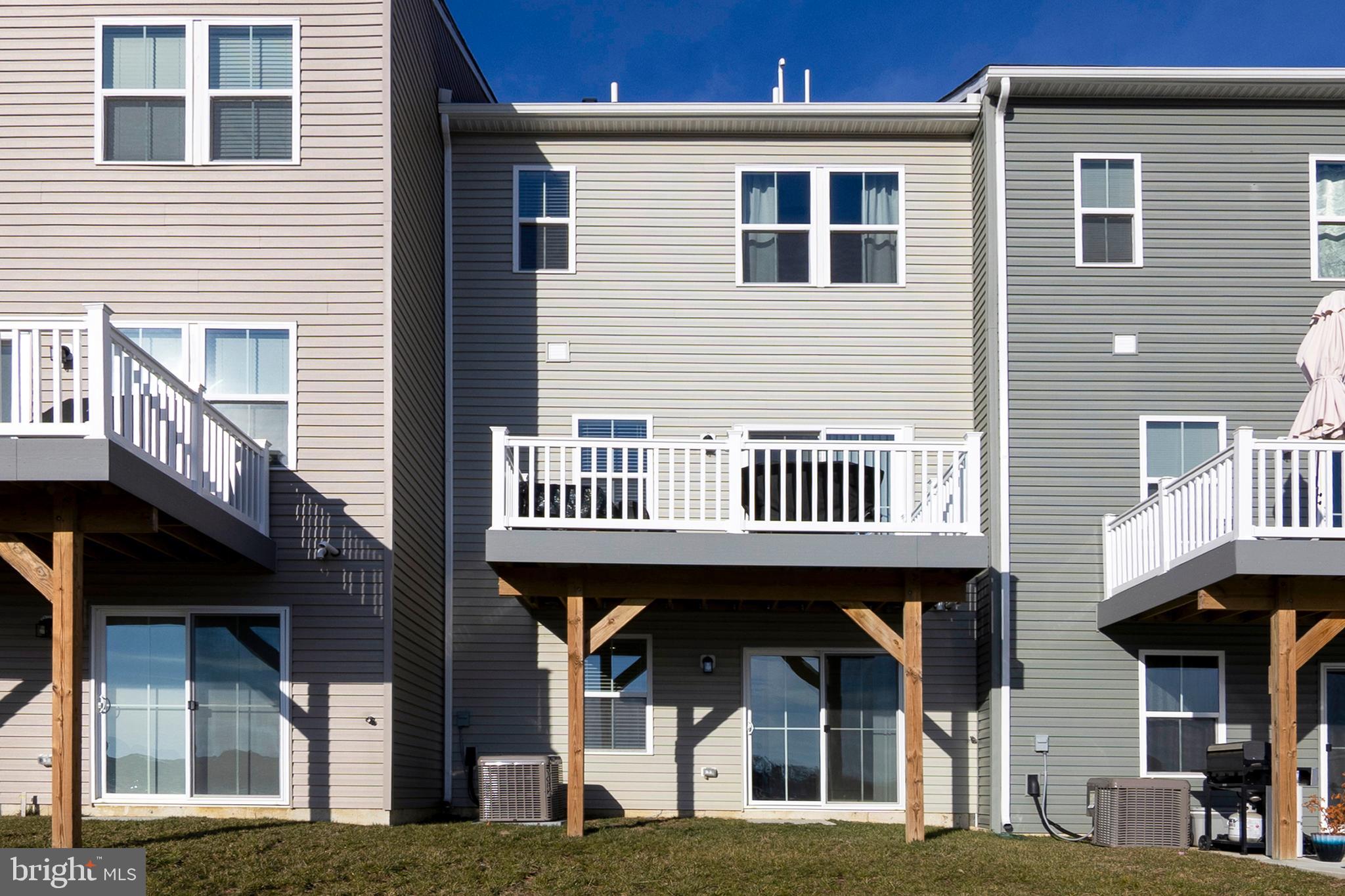 33 Roundstone Run Swedesboro, NJ 08085 - Photo 41 of 43 a view of a large building with a large window