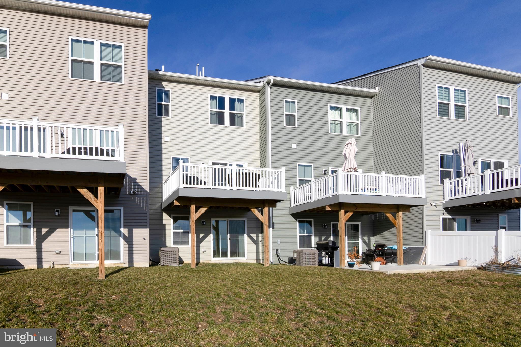 33 Roundstone Run Swedesboro, NJ 08085 - Photo 42 of 43 a group of people sitting in front of a building