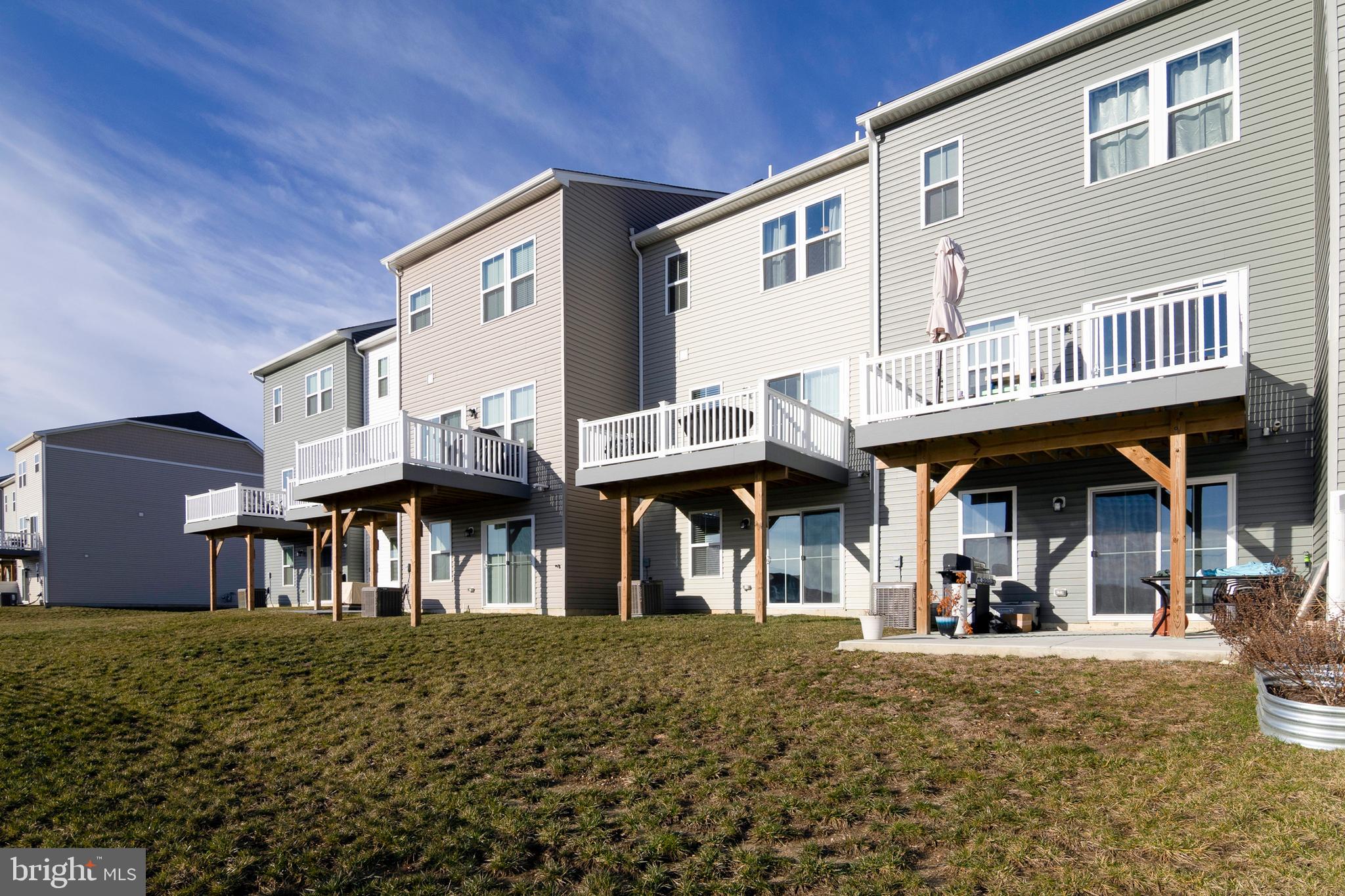 33 Roundstone Run Swedesboro, NJ 08085 - Photo 43 of 43 a front view of a building with street