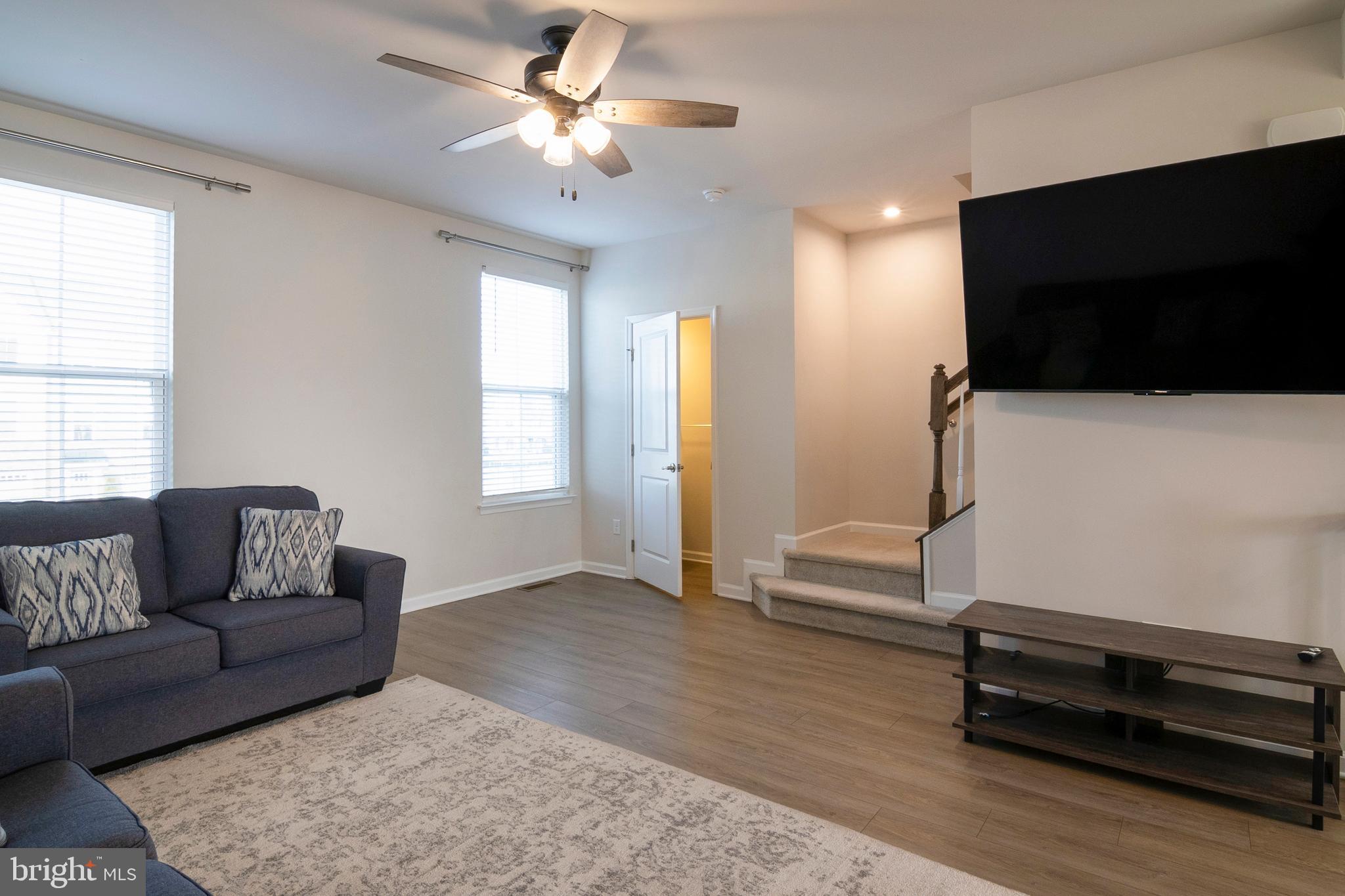 33 Roundstone Run Swedesboro, NJ 08085 - Photo 9 of 43 a living room with furniture and a flat screen tv