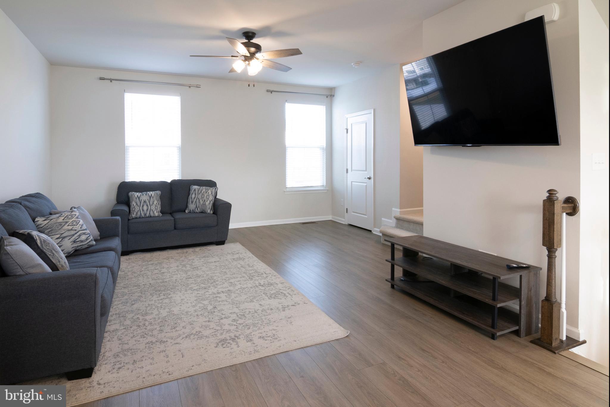 33 Roundstone Run Swedesboro, NJ 08085 - Photo 10 of 43 a living room with furniture and a flat screen tv