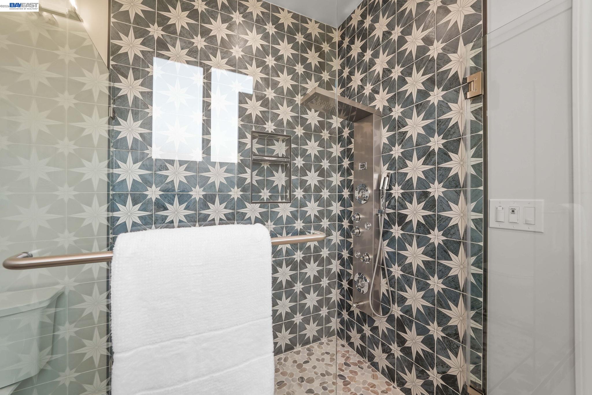 40772 Blacow Road Fremont, CA 94538 - Photo 30 of 40 a bathroom with a shower and a sink