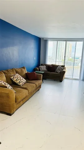 a workspace with furniture and a lamp