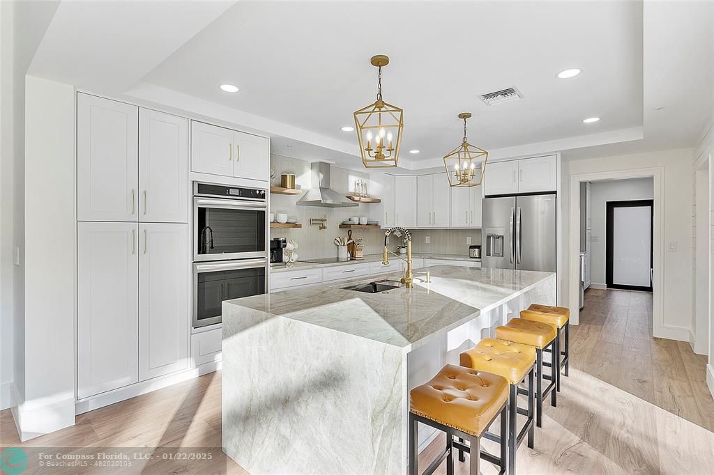 3540 Northeast 28th Avenue Lighthouse Point, FL 33064 - Photo 20 of 53 Massive kitchen island