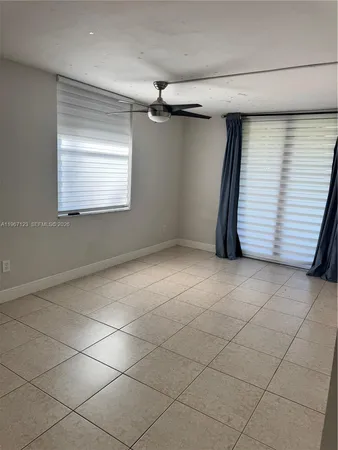a bathroom with a shower and toilet