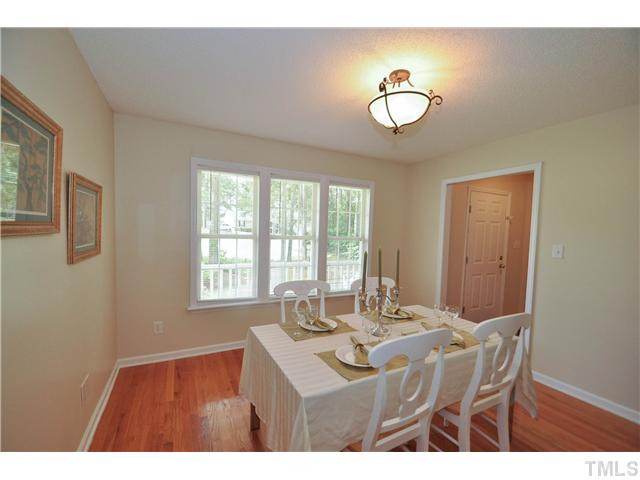 223 Ridge Drive Garner, NC 27529 - Photo 6 of 20 Beautiful formal dining room with gleaming hardwoods and a large wall of windows with tons of natural lighting. A perfect place to enjoy a special meal Dining Room