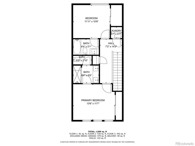 a picture of a bench in front of a wall