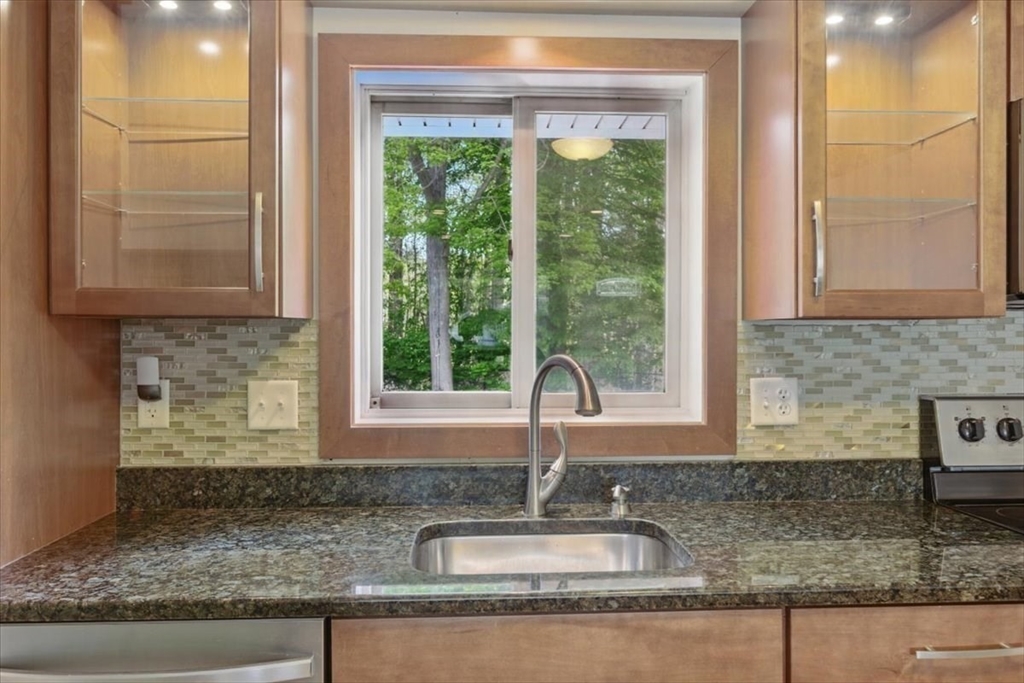 15 Temi Road Beverly, MA 01915 - Photo 12 of 41 a kitchen with granite countertop a sink a counter top space and cabinets