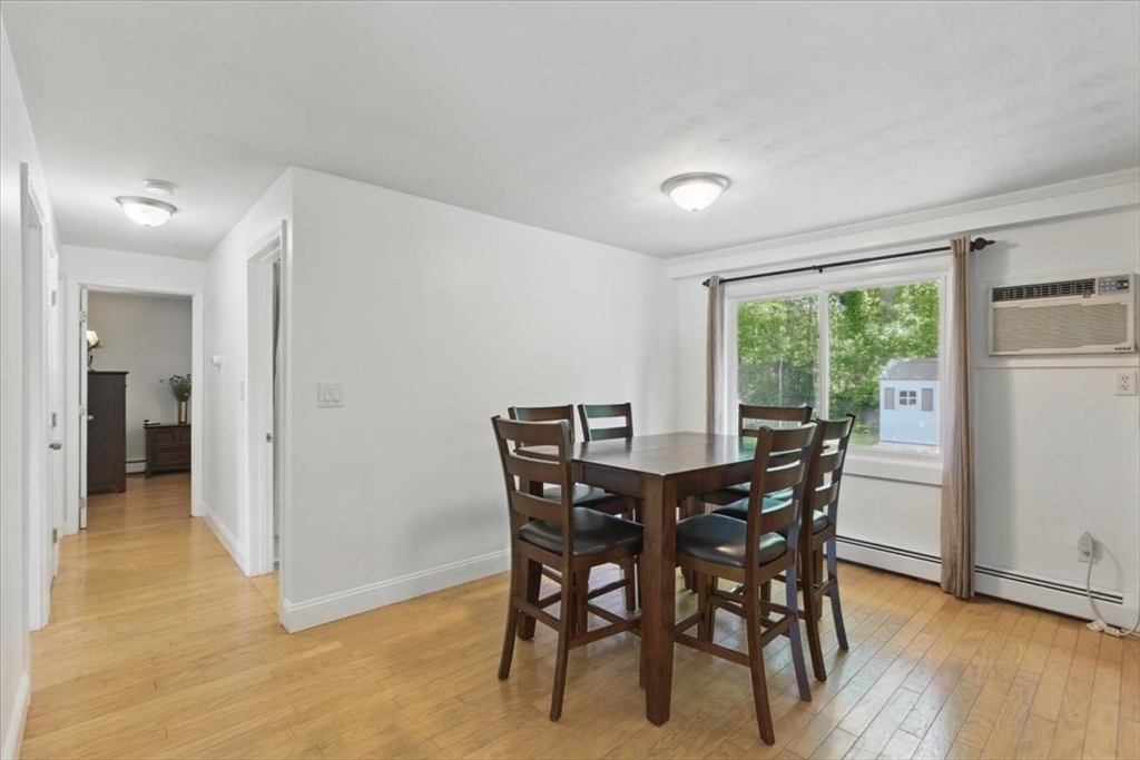 15 Temi Road Beverly, MA 01915 - Photo 18 of 41 a view of a dining room with furniture and wooden floor
