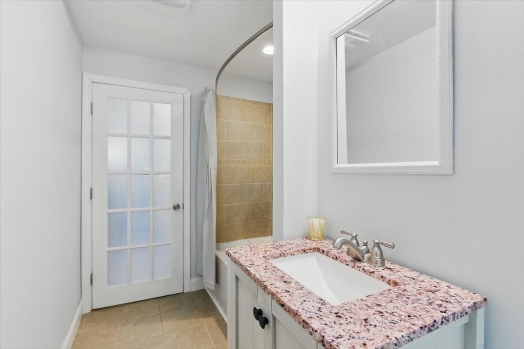 15 Temi Road Beverly, MA 01915 - Photo 20 of 41 a bathroom with a sink vanity and a mirror