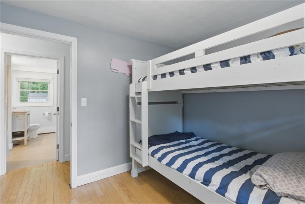 15 Temi Road Beverly, MA 01915 - Photo 22 of 41 a bedroom with a bed and a large mirror