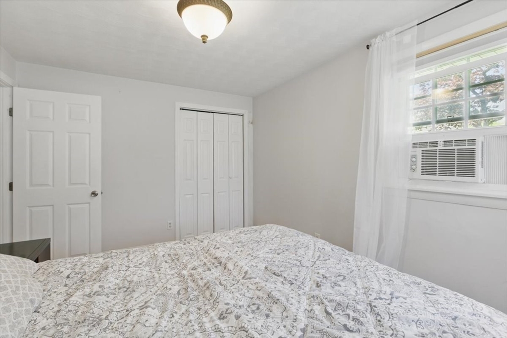 15 Temi Road Beverly, MA 01915 - Photo 24 of 41 a bedroom with a bed and a window