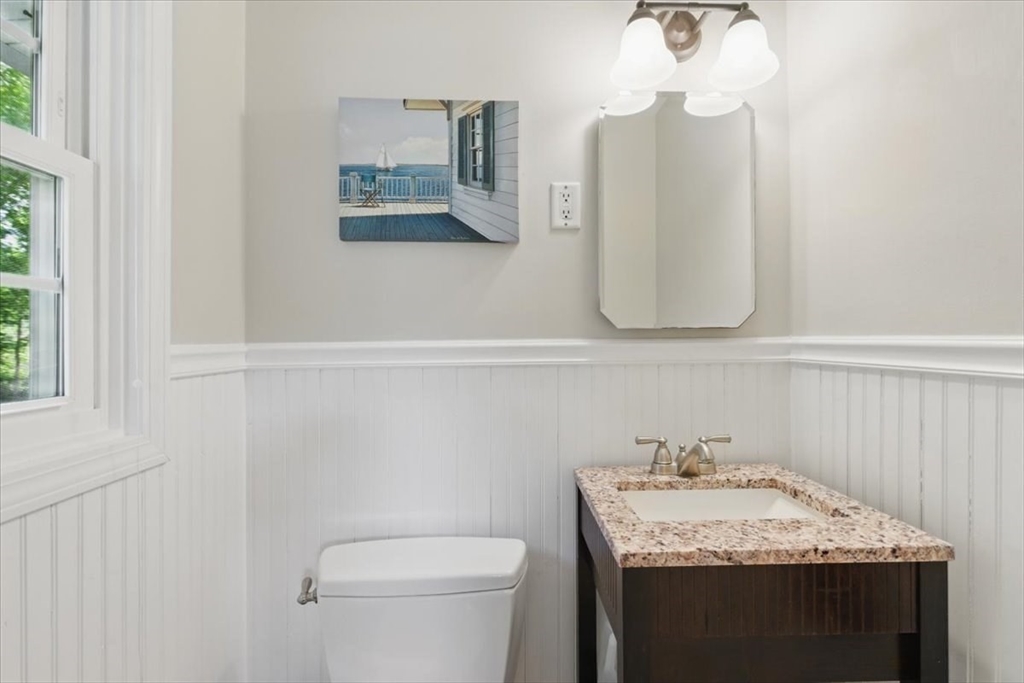 15 Temi Road Beverly, MA 01915 - Photo 28 of 41 a bathroom with a granite countertop sink and a toilet