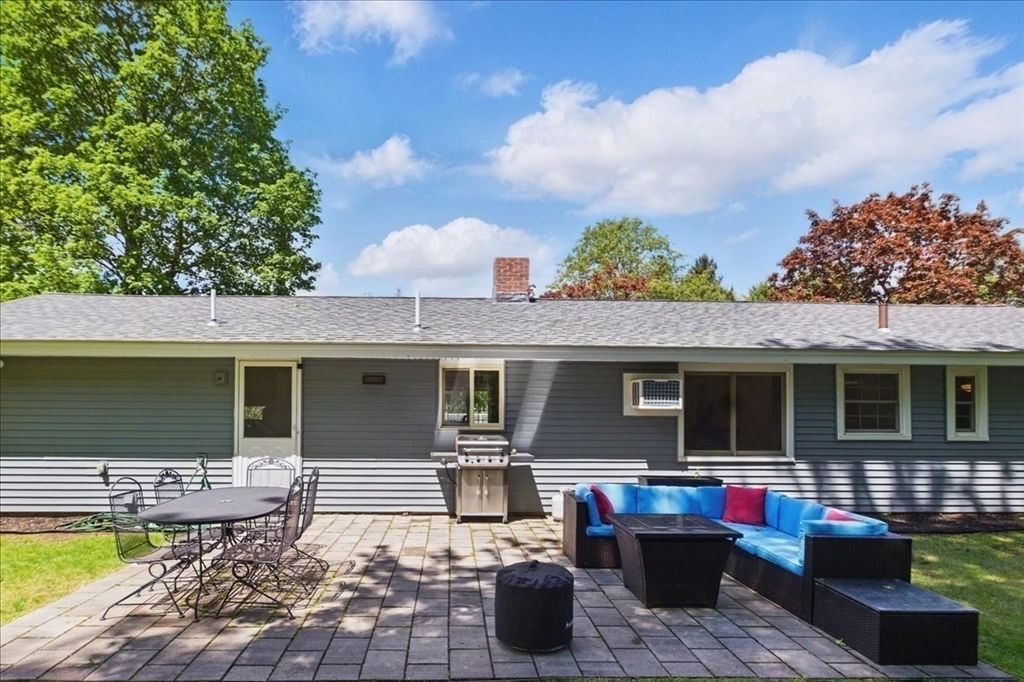 15 Temi Road Beverly, MA 01915 - Photo 38 of 41 a front view of a house with a garden