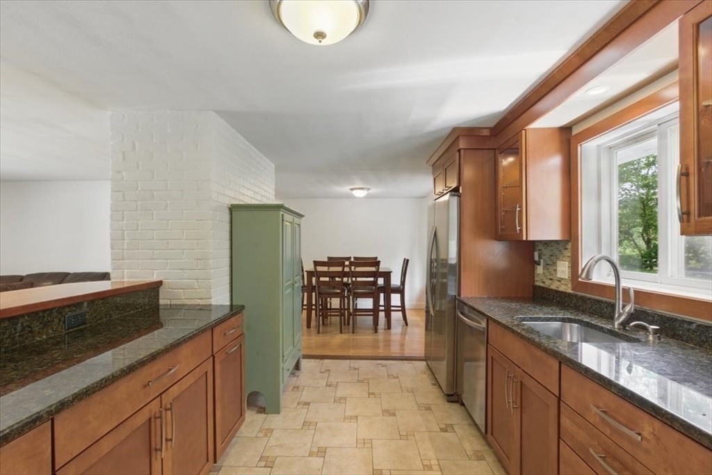 15 Temi Road Beverly, MA 01915 - Photo 8 of 41 a large kitchen with granite countertop a sink and a stove