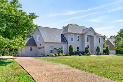 a front view of house with yard