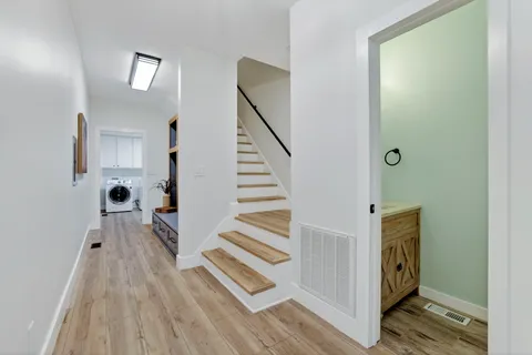 a view of an empty room with a window