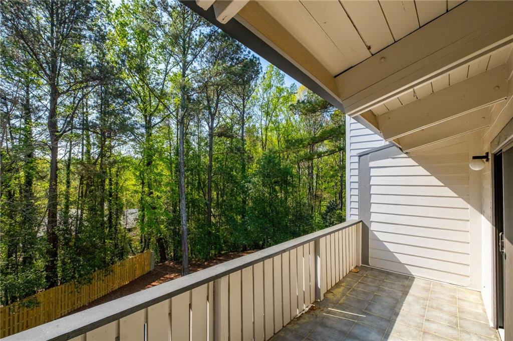 3817 Paces Ferry West Atlanta, GA 30339 - Photo 19 of 34 a view of a balcony with trees