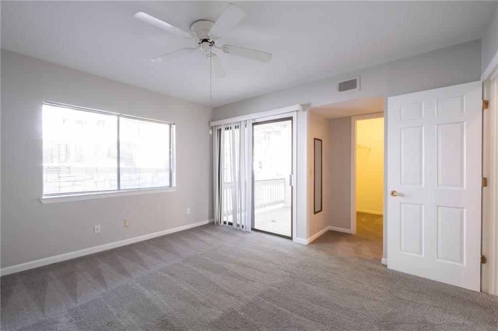 3817 Paces Ferry West Atlanta, GA 30339 - Photo 21 of 34 a view of empty room with window and ceiling fan