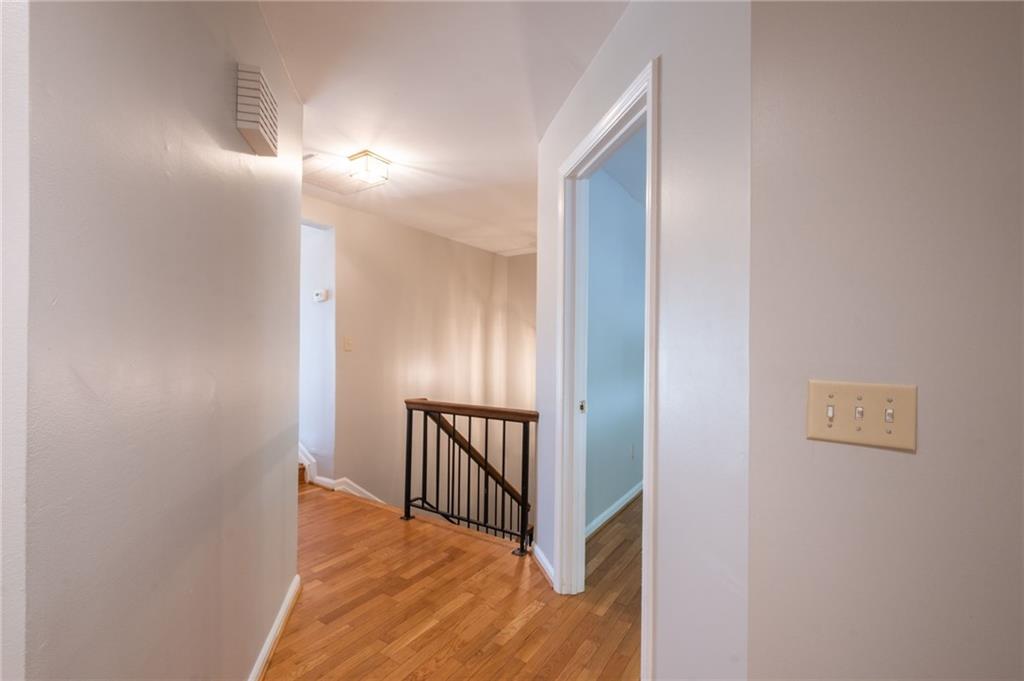 3817 Paces Ferry West Atlanta, GA 30339 - Photo 5 of 34 a view of a hallway with wooden floor and entryway