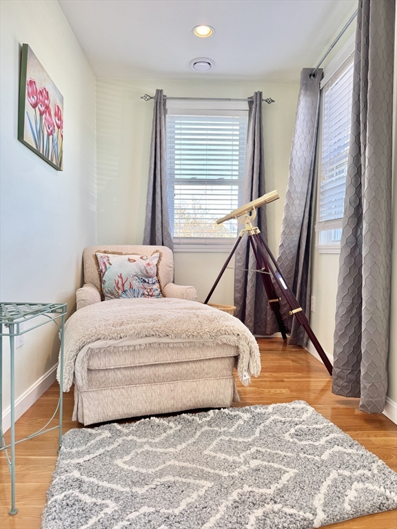 181 Atlantic Avenue Hull, MA 02045 - Photo 13 of 42 a bedroom with a bed and a rug