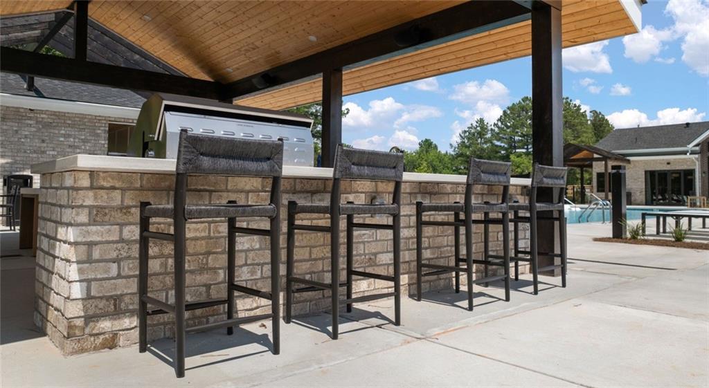 100 Rosemoore Drive Covington, GA 30014 - Photo 29 of 41 a view of a chairs with a outdoor space