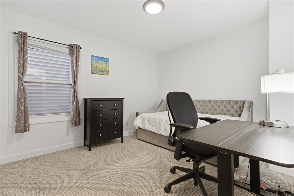 281 West 2nd Street, Unit A1 Boston, MA 02127 - Photo 11 of 17 a workspace with furniture and window