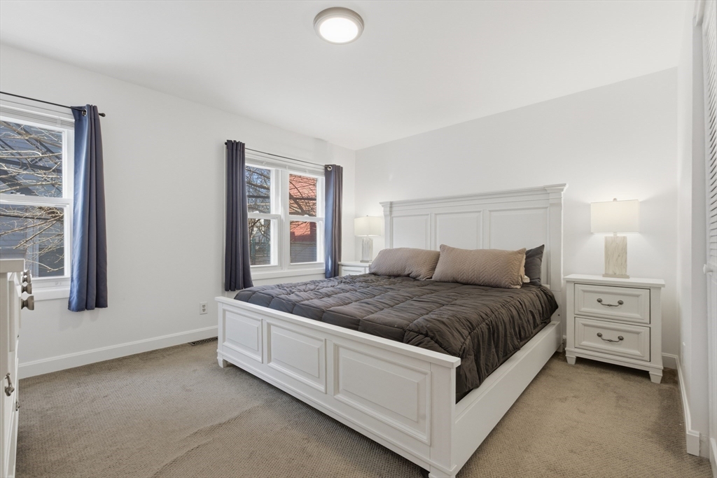 281 West 2nd Street, Unit A1 Boston, MA 02127 - Photo 9 of 17 a spacious bedroom with a bed and window
