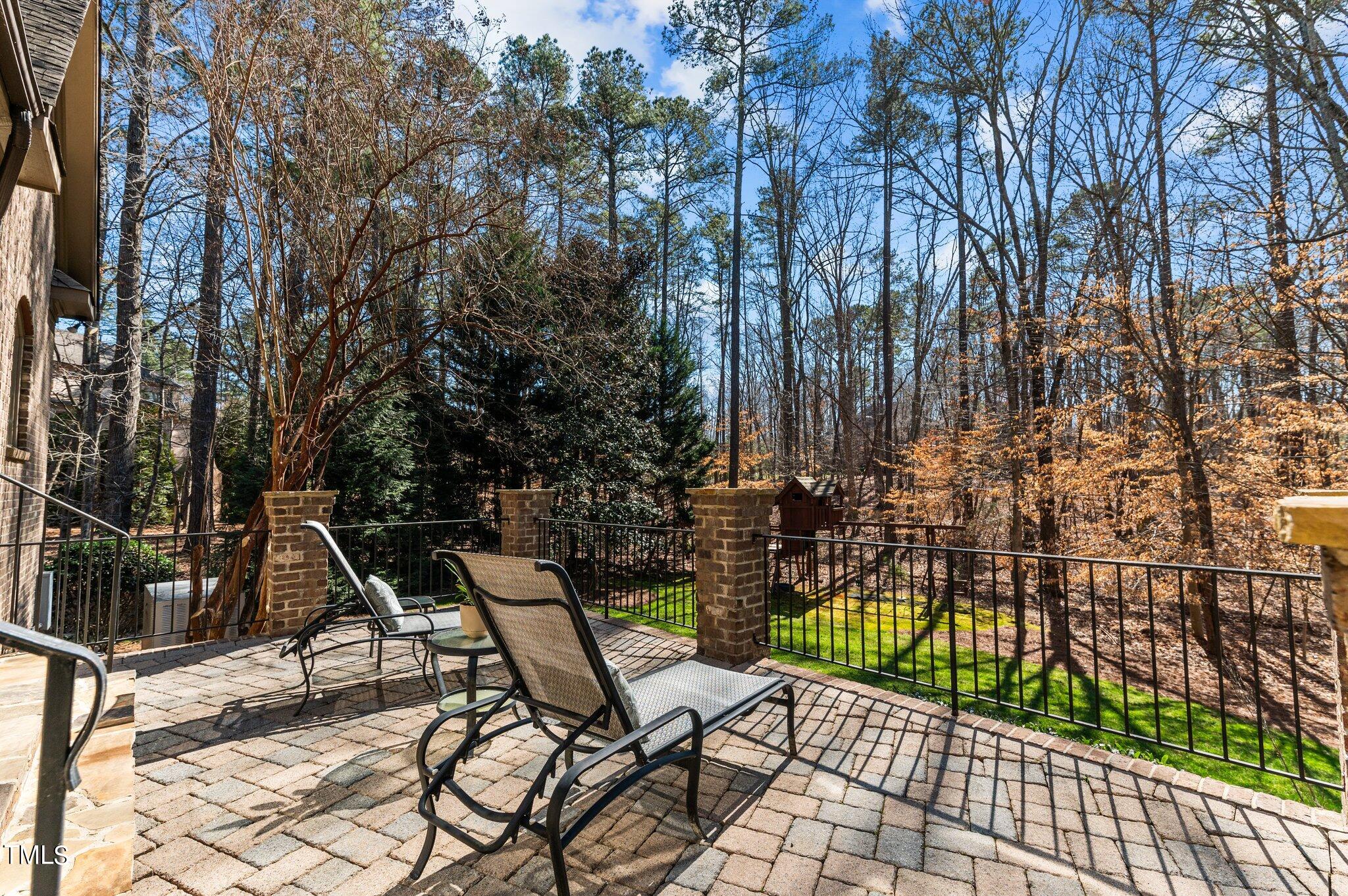 2108 Cadenza Lane Raleigh, NC 27614 - Photo 22 of 43 From the Four Seasons Room, step out to the stone patio. Great for sunning, checking out the views and entertaining!