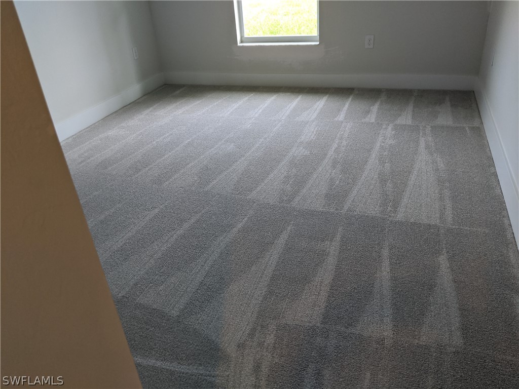 2930 18th Street Southwest Lehigh Acres, FL 33976 - Photo 14 of 20 a view of a room