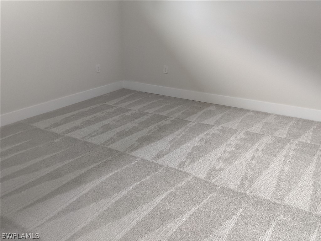 2930 18th Street Southwest Lehigh Acres, FL 33976 - Photo 3 of 20 a view of empty room