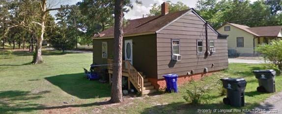 308 John Street Spring Lake, NC 28390 - Photo 2 of 3 a view of a house and a yard