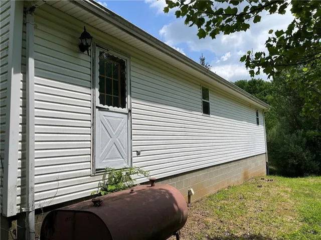 a view of a back yard of the house