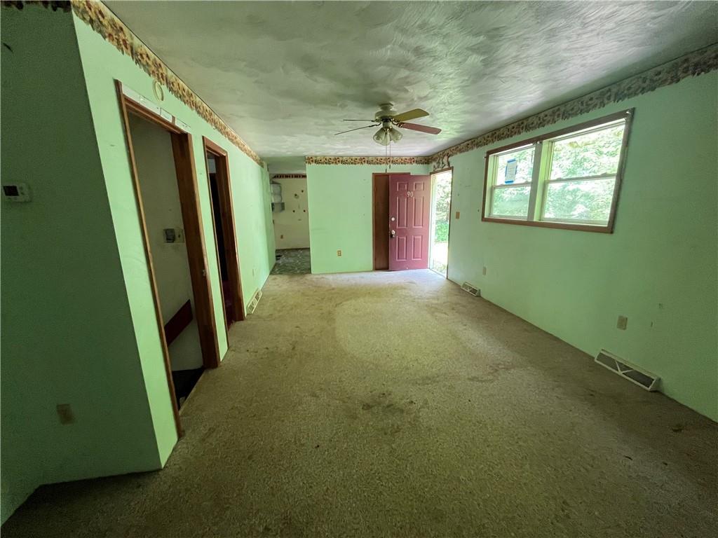 90 Grandview Avenue Indiana, PA 15701 - Photo 8 of 20 a view of an empty room with window and stairs