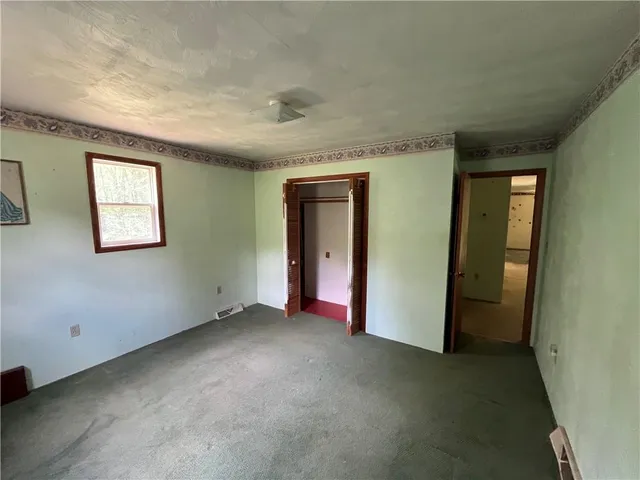 an empty room with windows