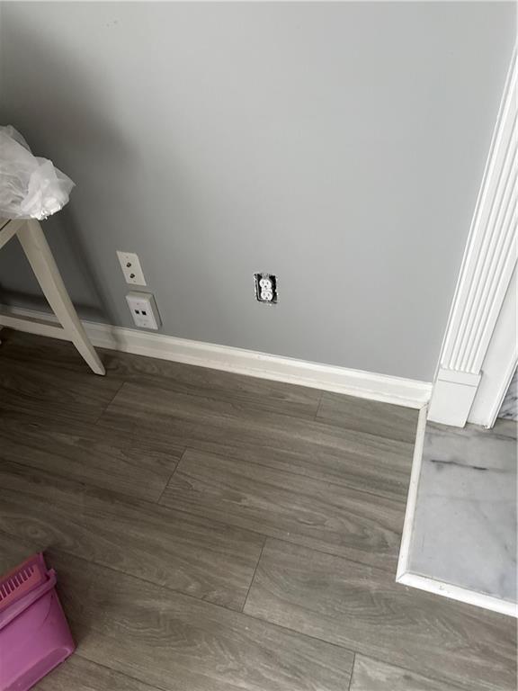 6341 Wedgeview Drive Tucker, GA 30084 - Photo 22 of 26 a view of an empty room with wooden floor and a window