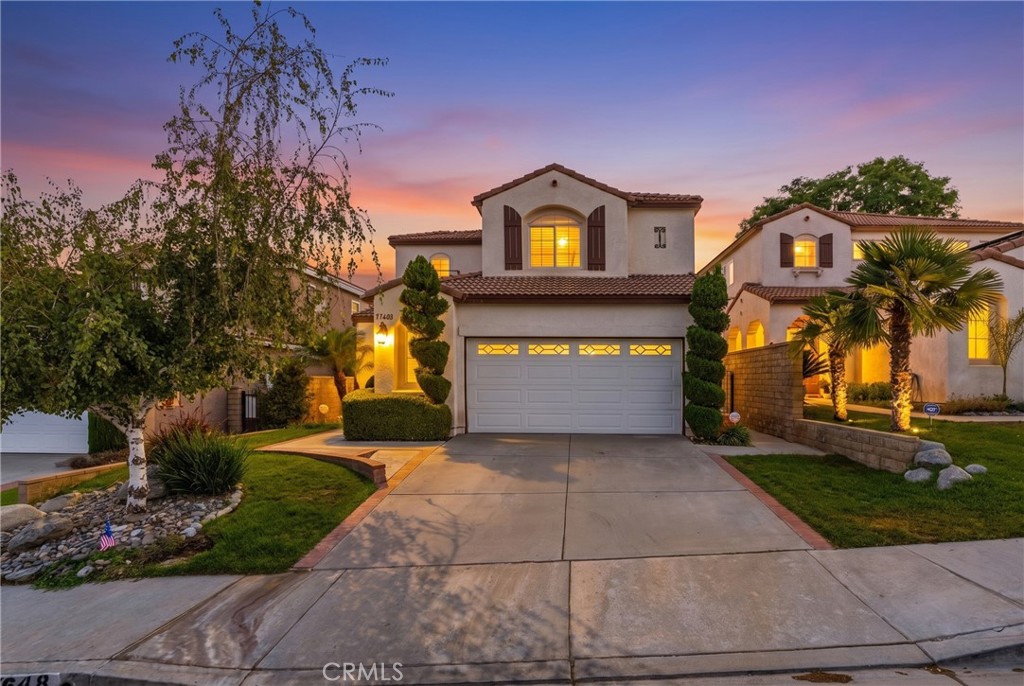 Virtually enhanced/staged with twilight setting and indoor/outdoor lighting
