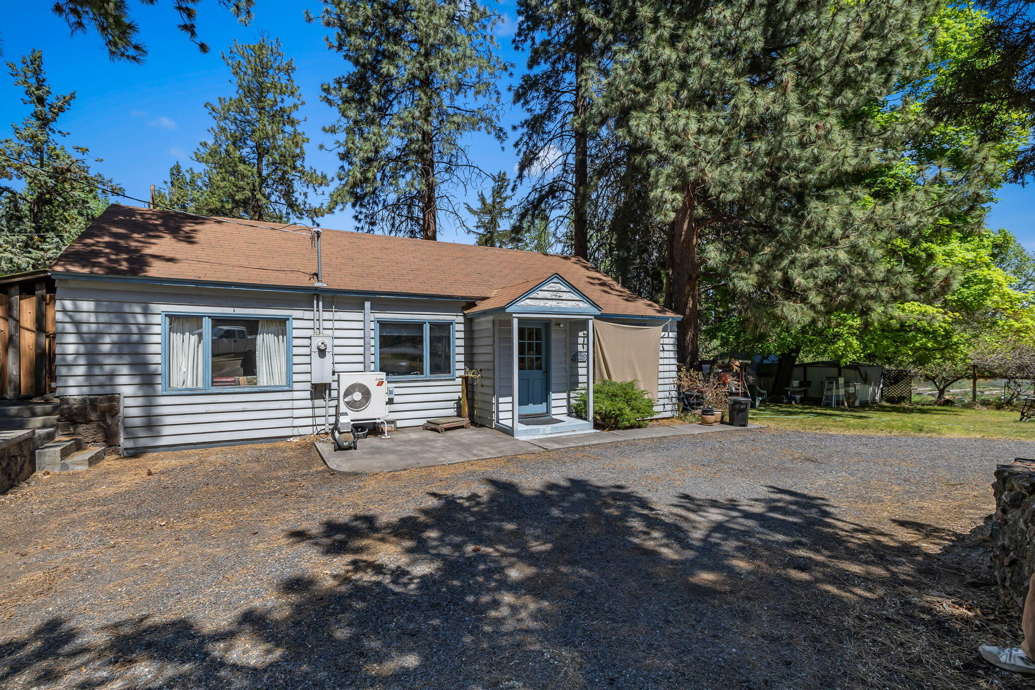 2291 Northeast 8th Street Bend, OR 97701 - Photo 3 of 22 Set in the ponderosa trees- quiet and peaceful