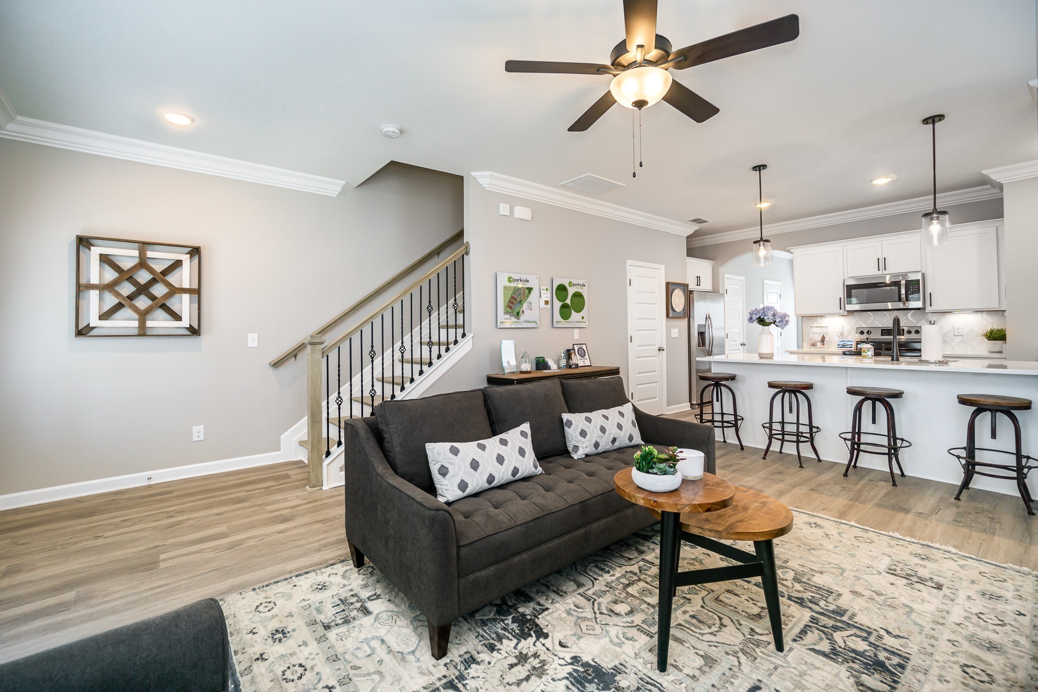 1744 Fenway Loop Antioch, TN 37013 - Photo 10 of 38 a living room with furniture kitchen view and a wooden floor
