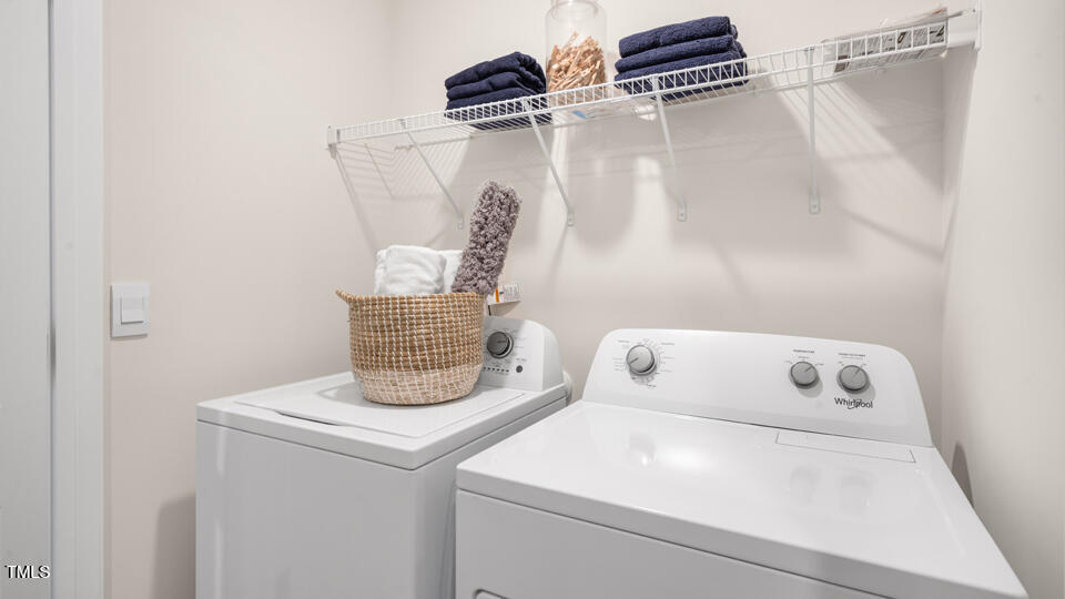 8746 Asher Gray Way Raleigh, NC 27616 - Photo 25 of 29 a utility room with dryer and washer