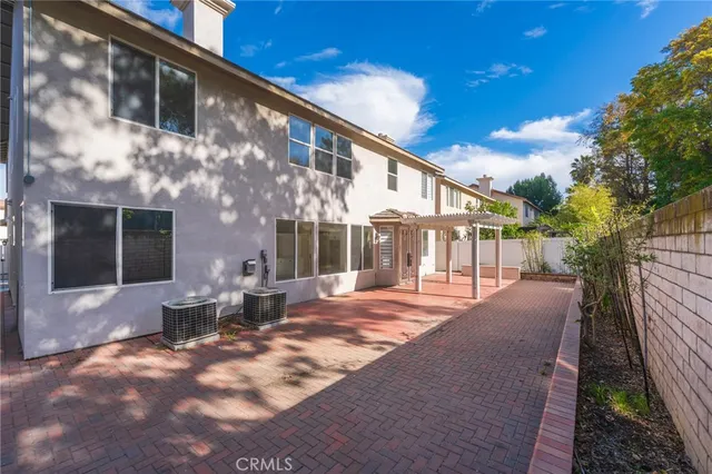 a view of a building with a patio