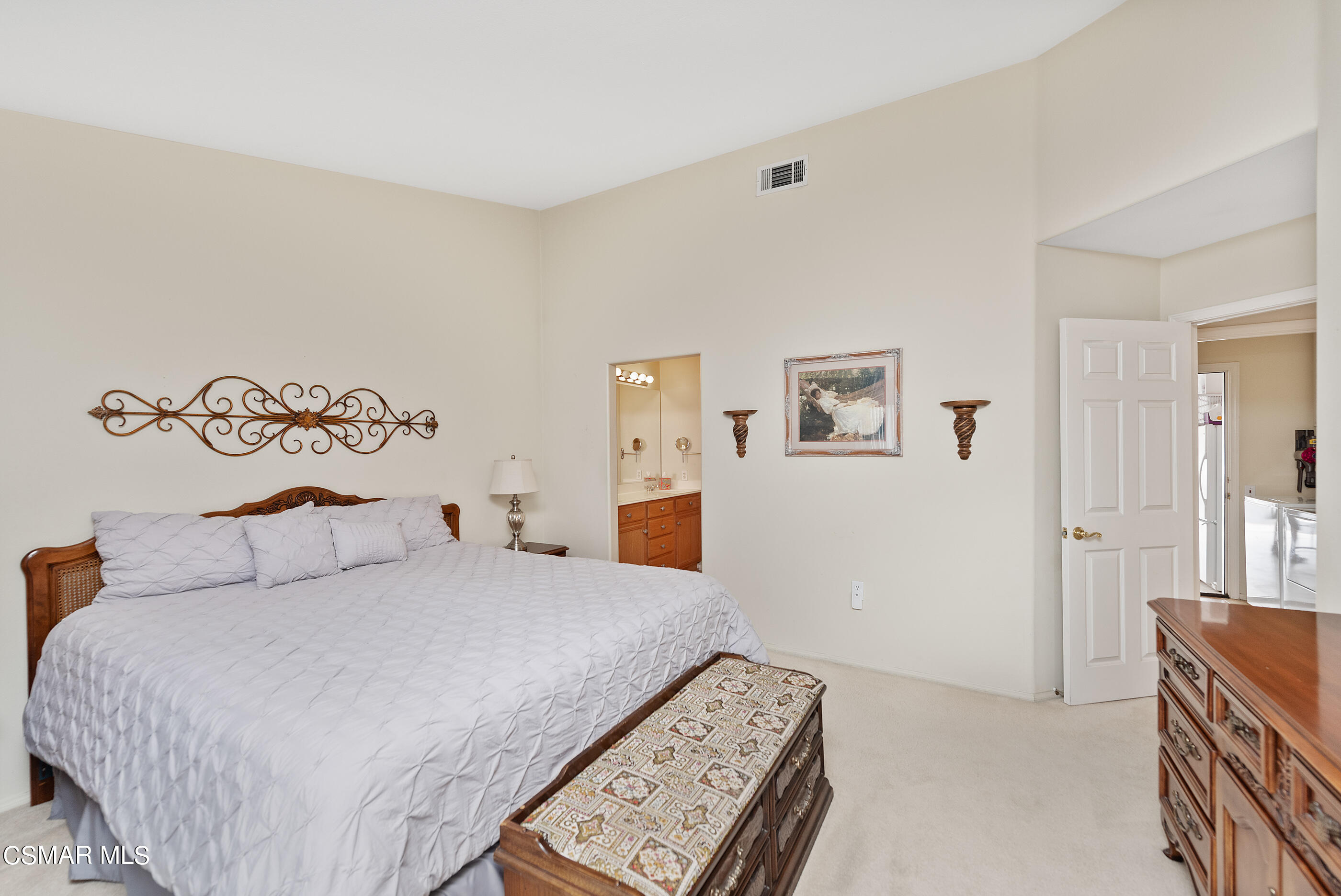 5642 Daisy Street Simi Valley, CA 93063 - Photo 20 of 41 a bedroom with a bed and a lamp with window